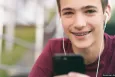 Teenager holding a phone