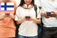 Teenagers using smartphones