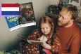 Dad reading with his child