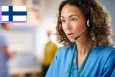 A young woman wearing a headset and working at a hotline