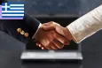 Two shaking hands of businessmen