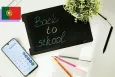 Back to school with a blackboard, a phone and plants
