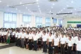 Group photo of  people who attended the Safer Internet Day event in Cambodia, standing in a conference hall