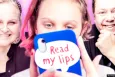 Cover of the campaign "Read my lips" featuring a young person on their phone and two older adults behind them.