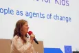 Girl talking with a mic in her hands
