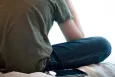 Boy holding his head